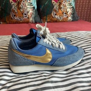 Nike blue and gold shoes
